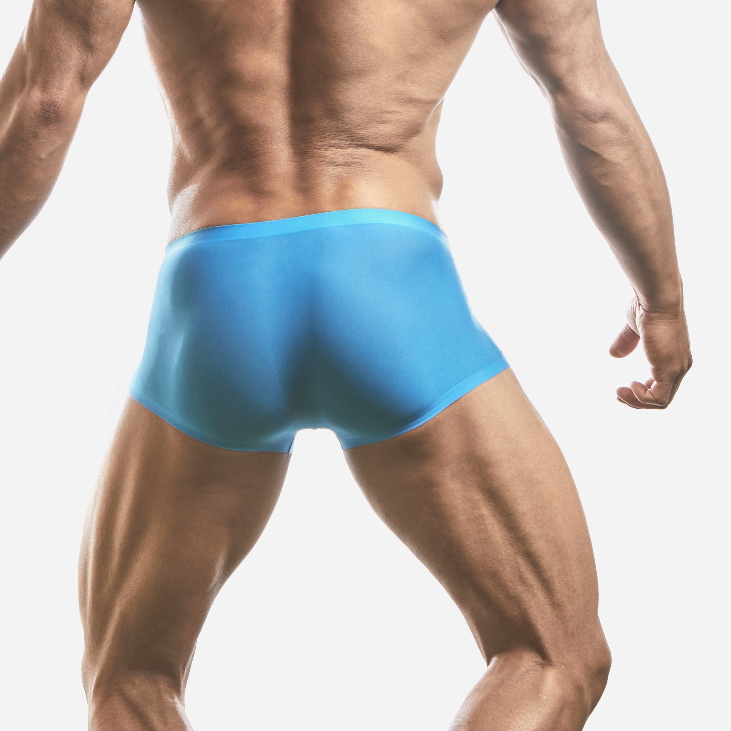 Back view of a man wearing a blue boxer brief that is made of a stretchy, smooth fabric